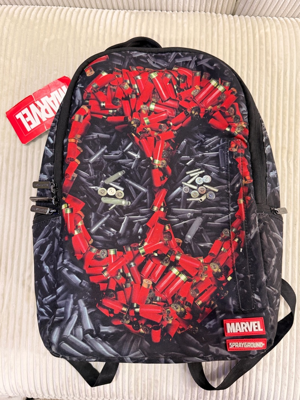 Sprayground Marvel Deadpool Shotgun Shell Skull Backpack in Red and Black